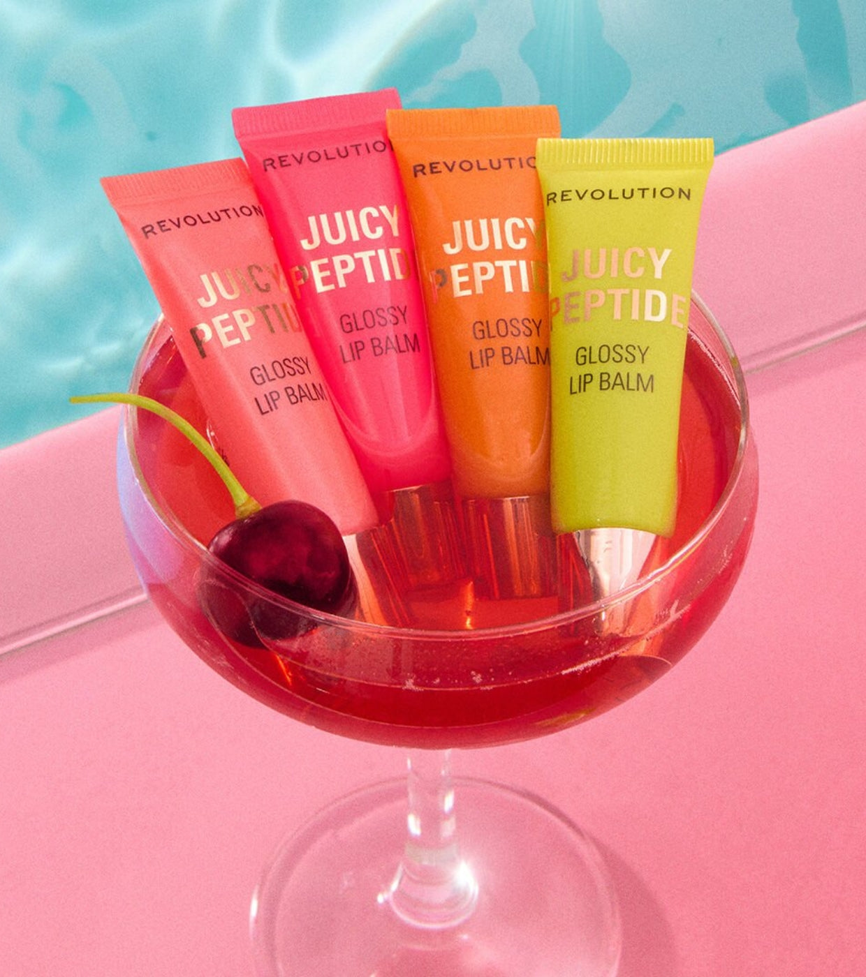 Makeup Revolution - Bálsamo de Brilho Labial Juicy Peptide - Guava Rum Punch Coral