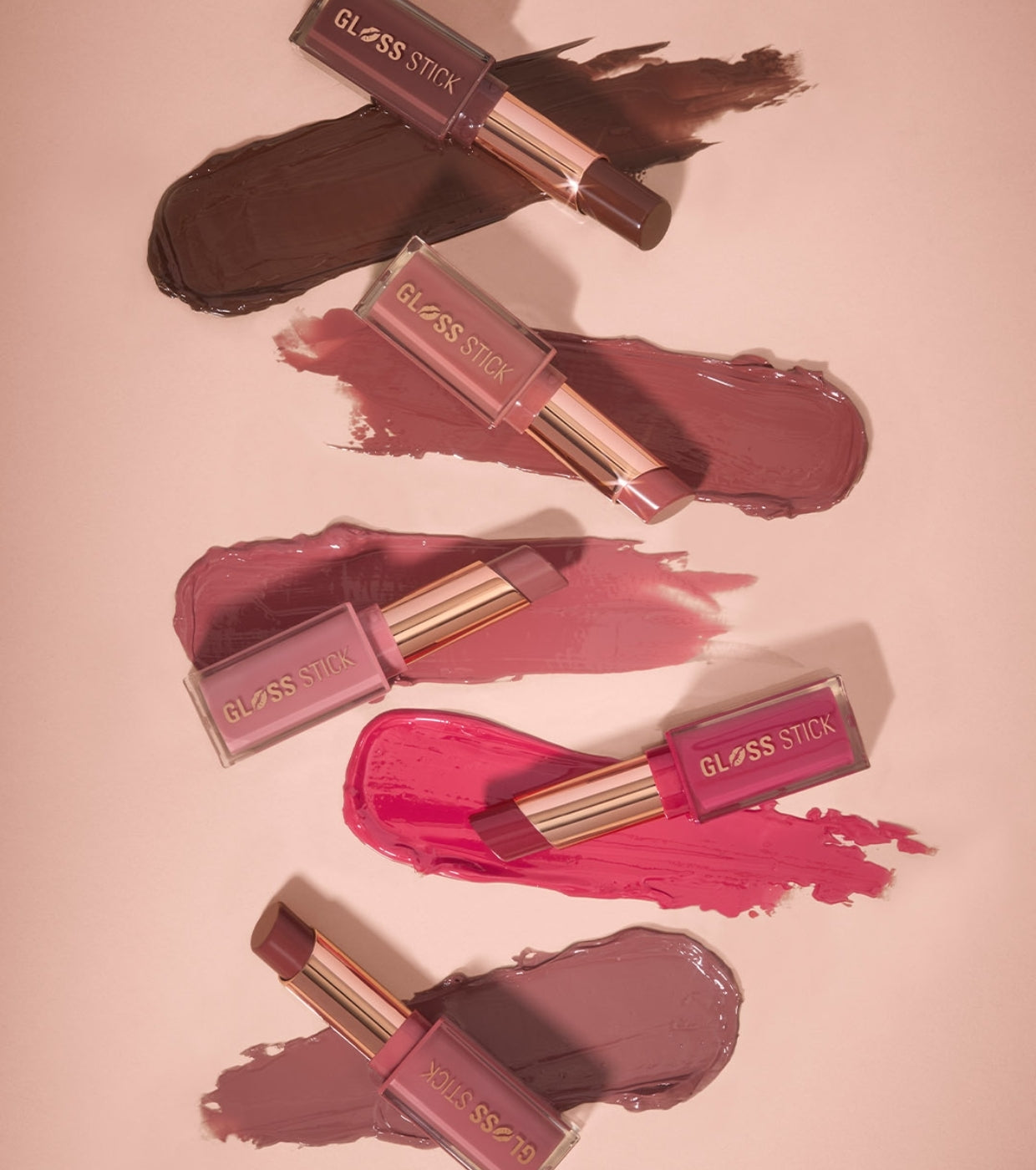 Makeup Revolution - Batom Pout Lip Gloss Stick - Sugar Plum Mauve